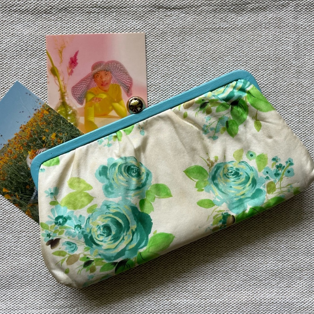 BR flower clutch bag, 10 x 5 “